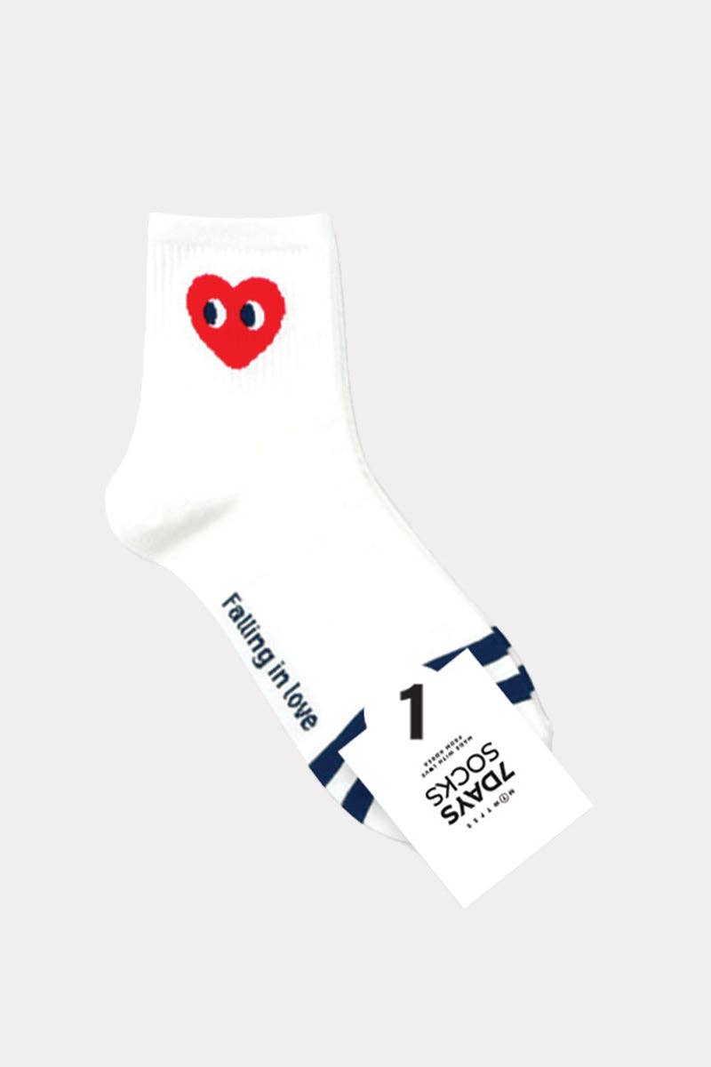 White socks with a red heart logo on a white background