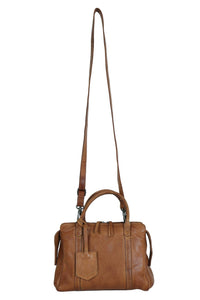 Brown leather handbag with a strap on a white background