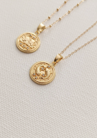 Gold Zodiac Coin Necklaces by Layer the Love